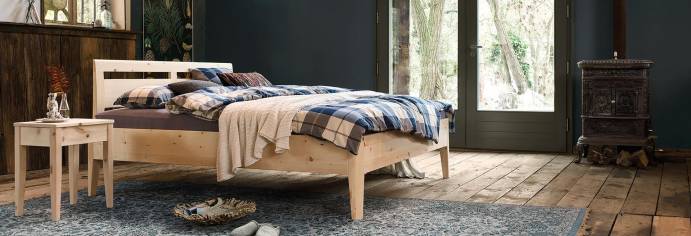 Dormiente Massivholzbett Kalmera